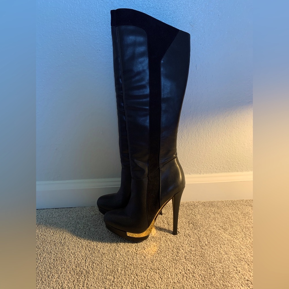 Fergi Black 5 1/2” knee high boots with gold lining on bottom